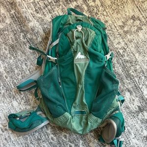 Small Gregory day pack with slot for hydration bladder.  Beautiful green color.
